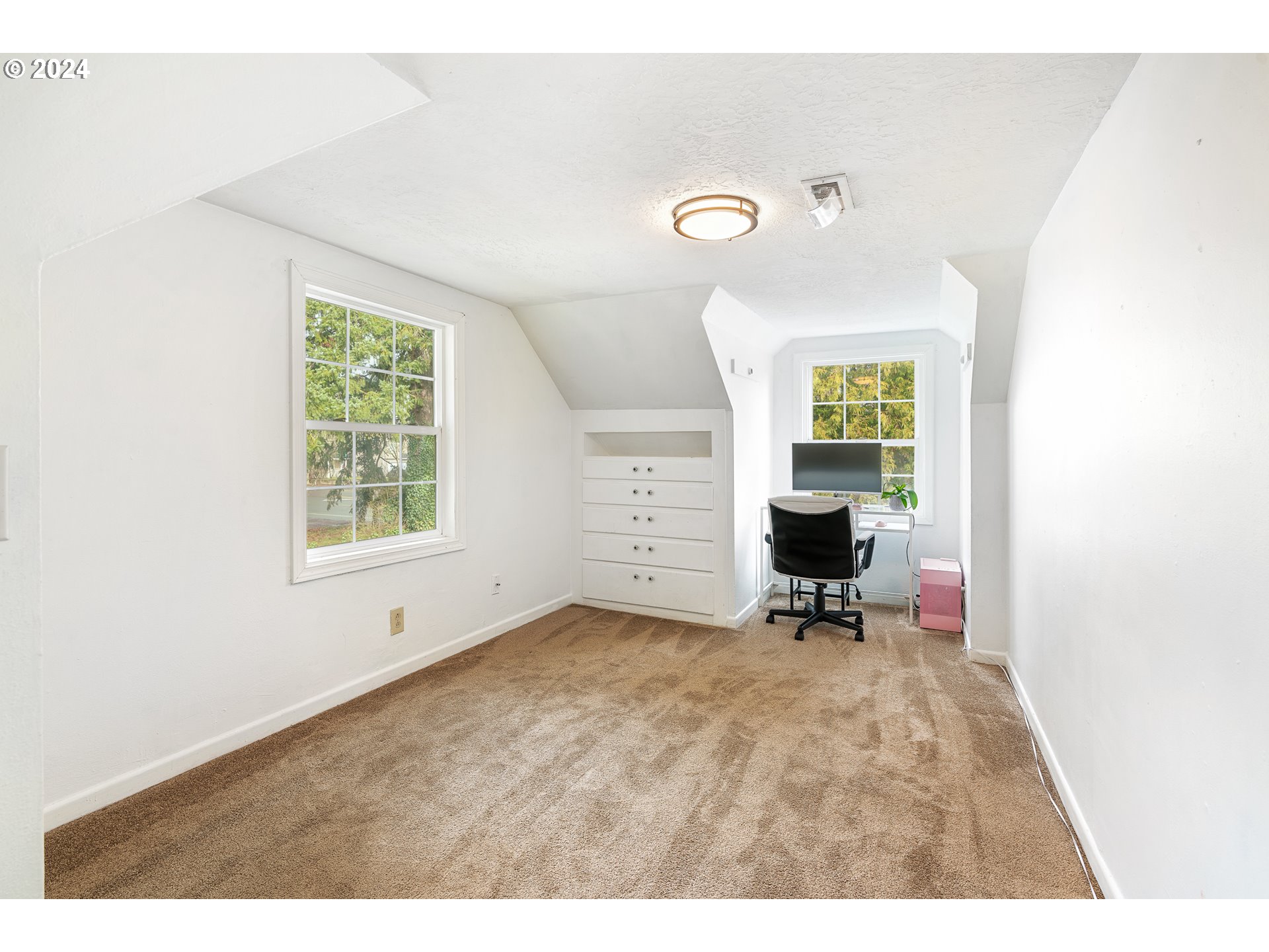 3305 Northwest Glencoe Road Hillsboro, OR 97124 - Photo 13 of 36 a view of a livingroom with a window