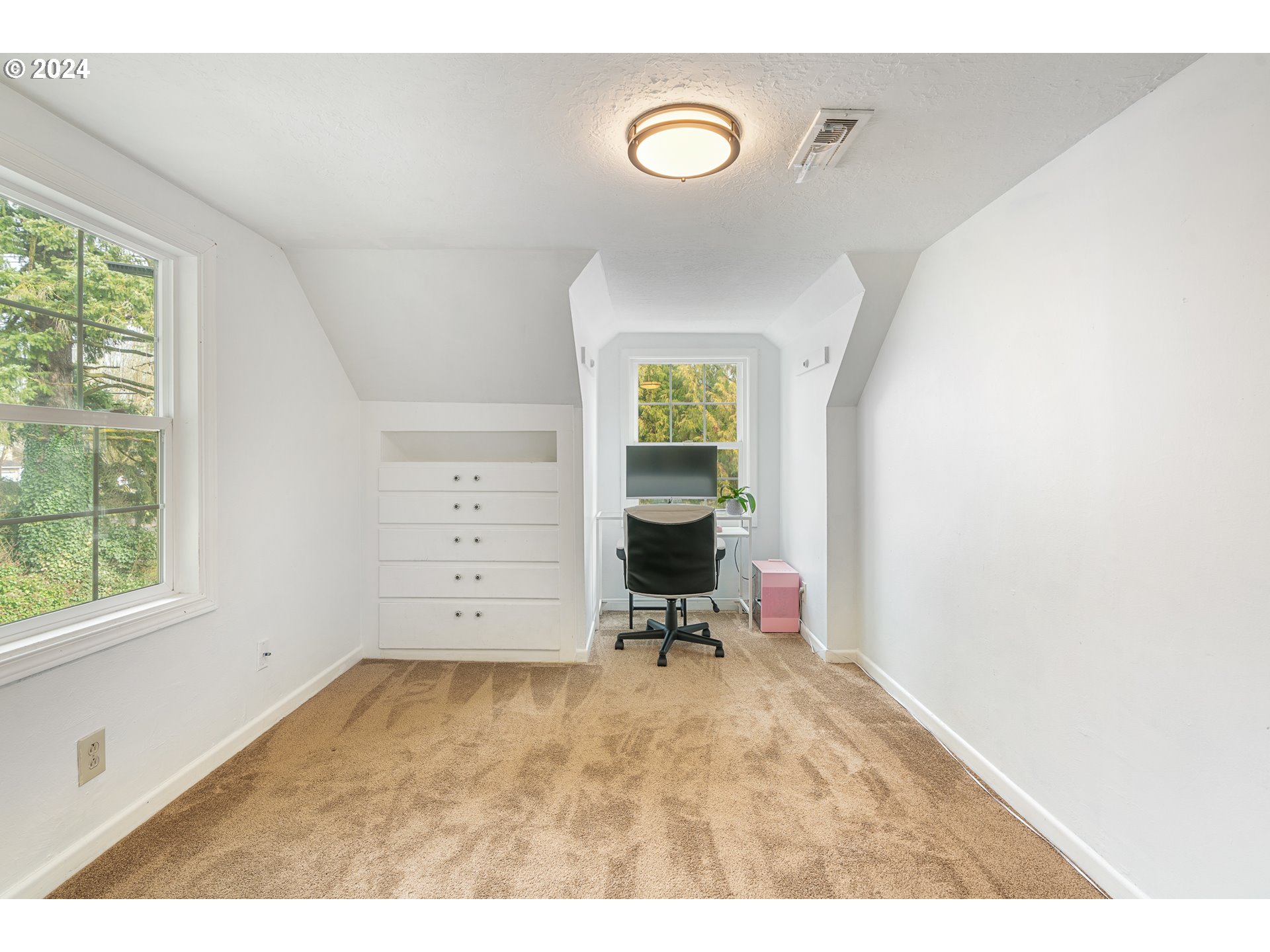 3305 Northwest Glencoe Road Hillsboro, OR 97124 - Photo 14 of 36 a view of a livingroom with furniture and a window