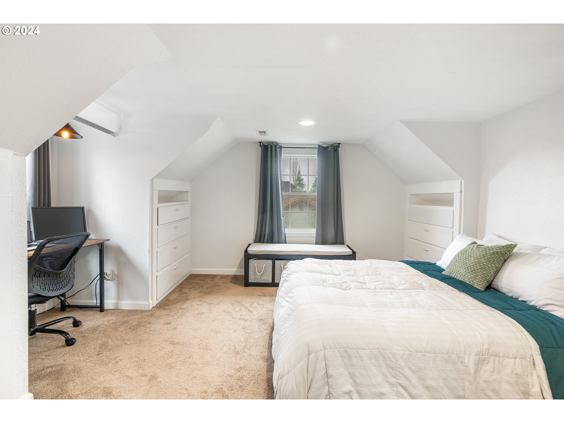 3305 Northwest Glencoe Road Hillsboro, OR 97124 - Photo 16 of 36 a bedroom with a bed a desk and chair