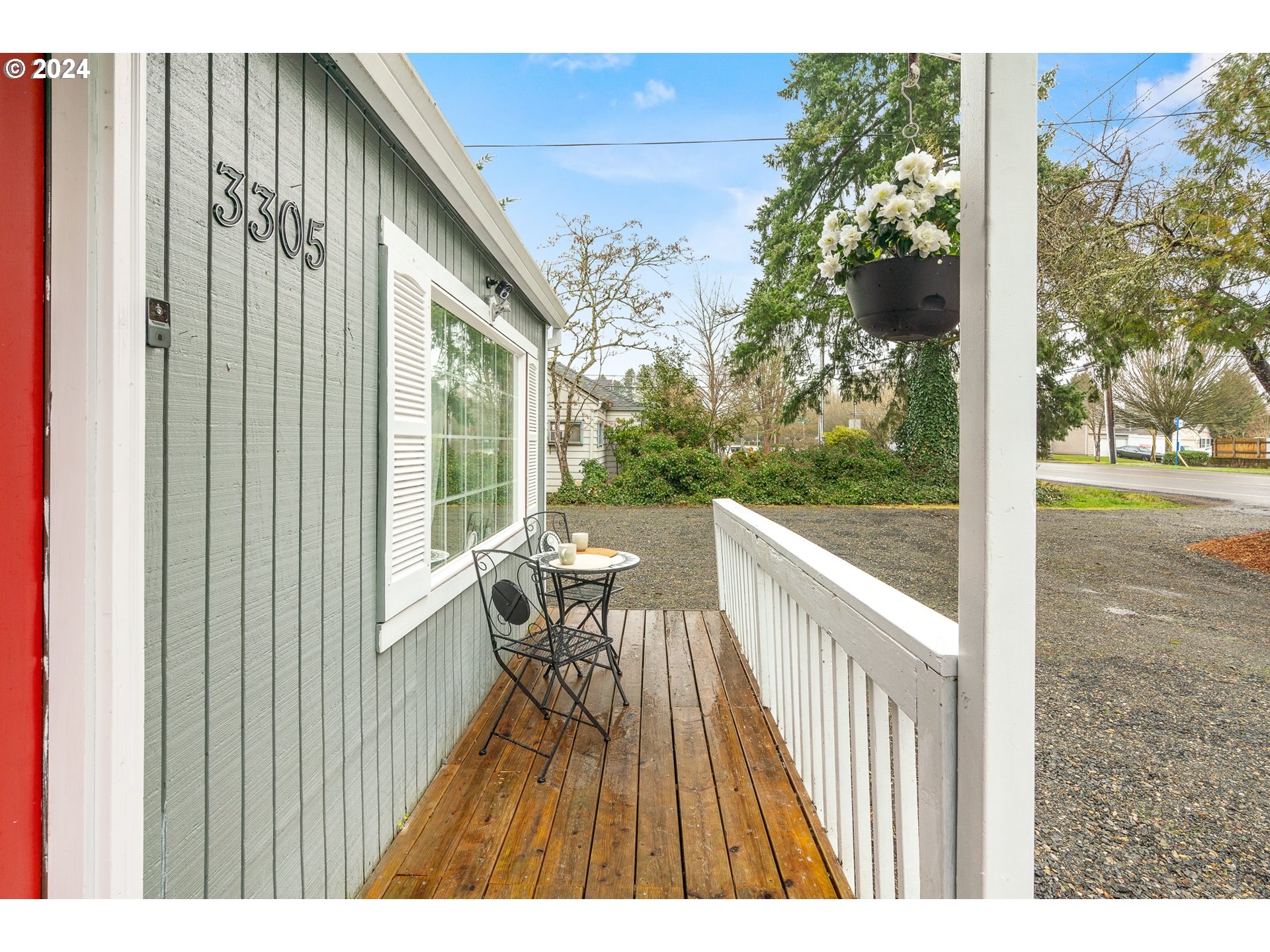 3305 Northwest Glencoe Road Hillsboro, OR 97124 - Photo 22 of 36 a balcony with wooden floor and outdoor space