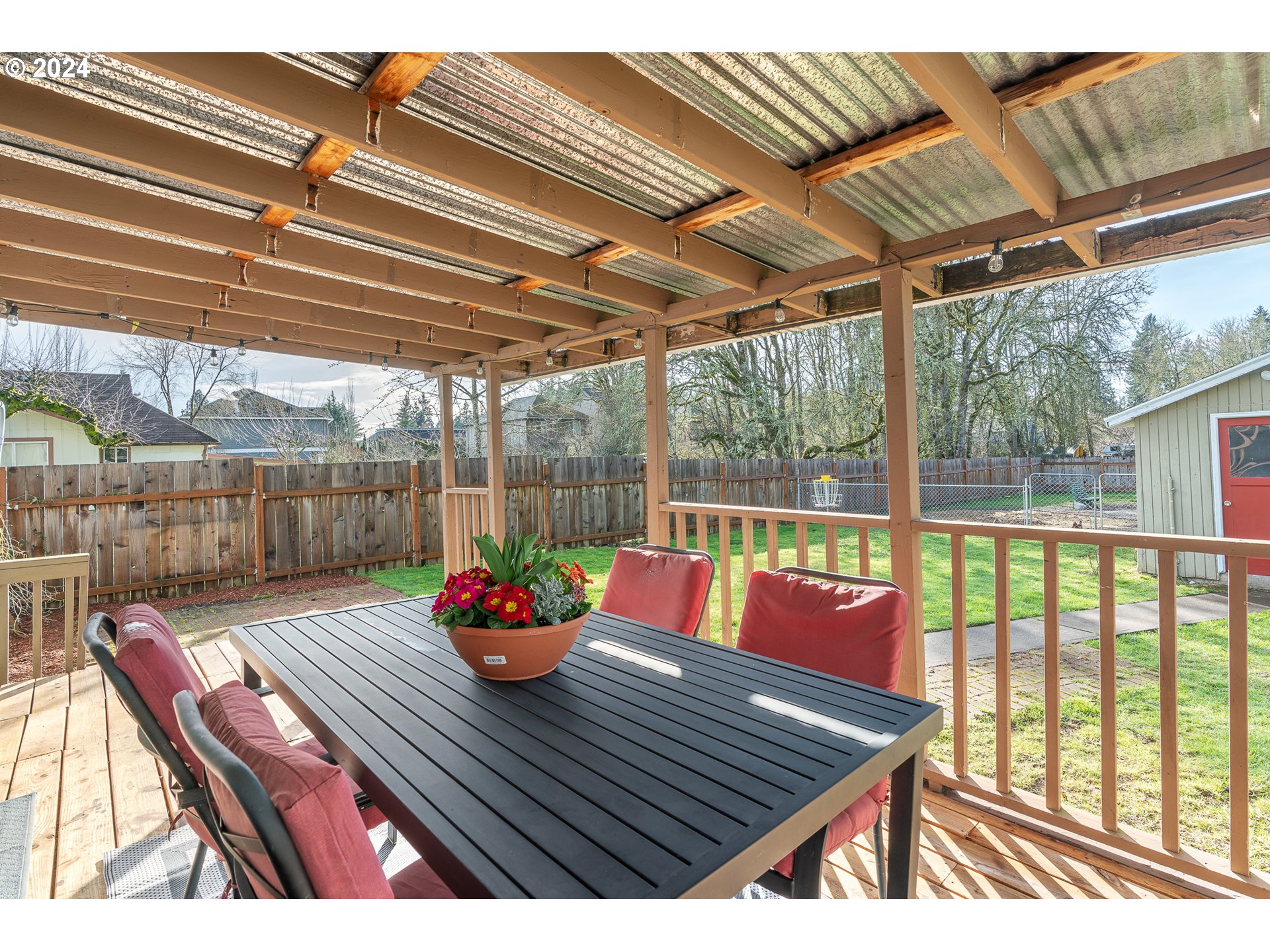 3305 Northwest Glencoe Road Hillsboro, OR 97124 - Photo 24 of 36 a outdoor sitting area with furniture and wooden floor