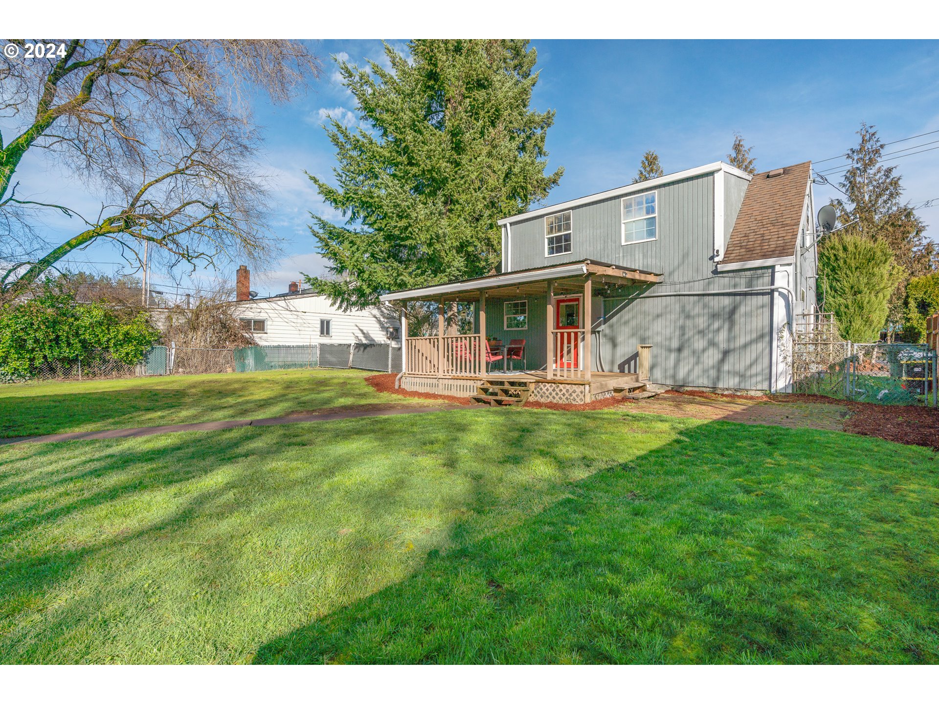 3305 Northwest Glencoe Road Hillsboro, OR 97124 - Photo 26 of 36 a view of a house with a backyard porch and sitting area
