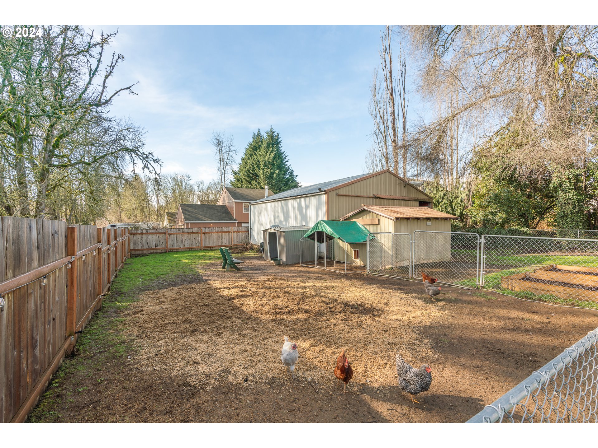 3305 Northwest Glencoe Road Hillsboro, OR 97124 - Photo 29 of 36 a view of a yard with wooden fence