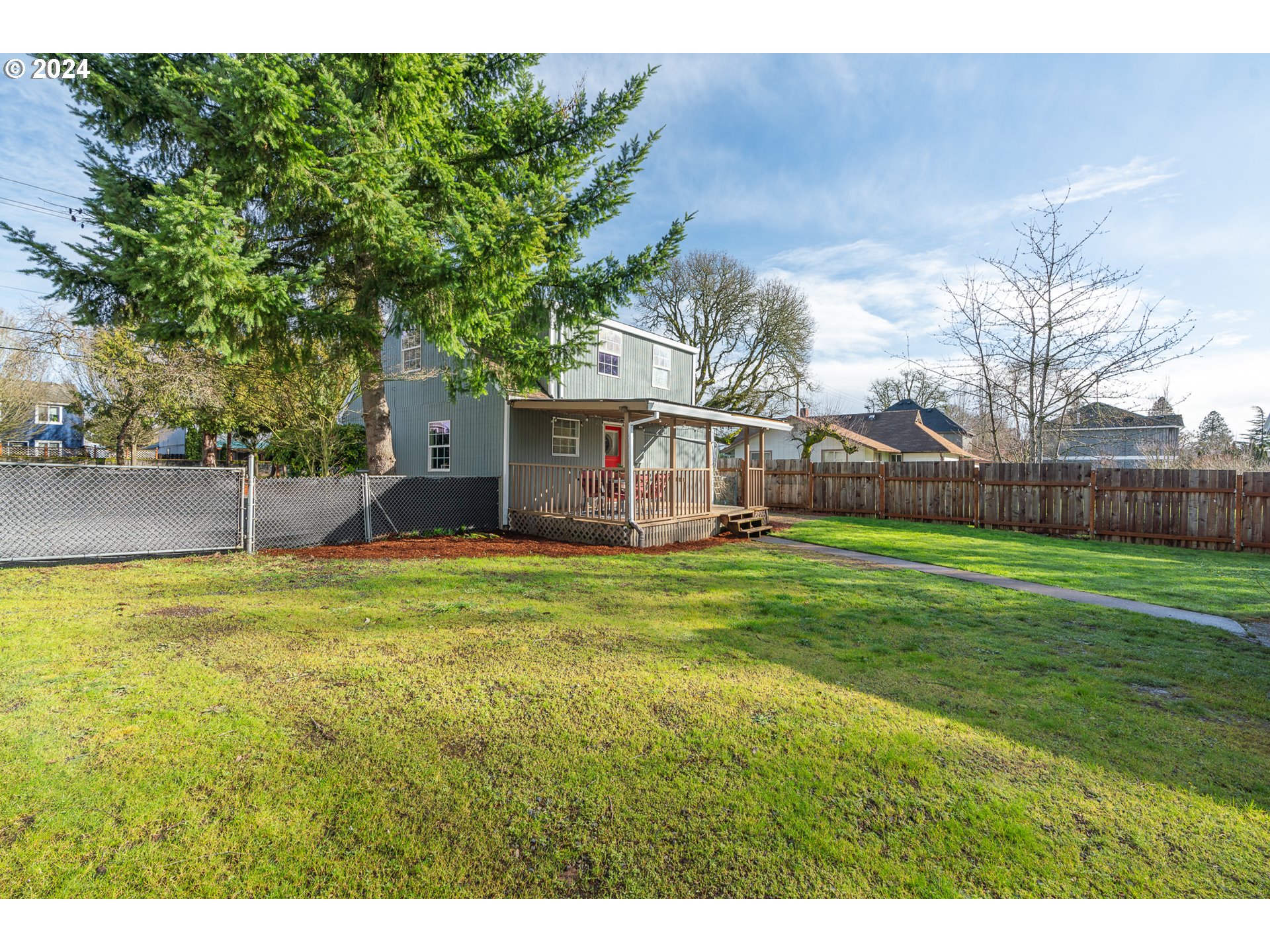 3305 Northwest Glencoe Road Hillsboro, OR 97124 - Photo 34 of 36 a view of a house with backyard and a garden
