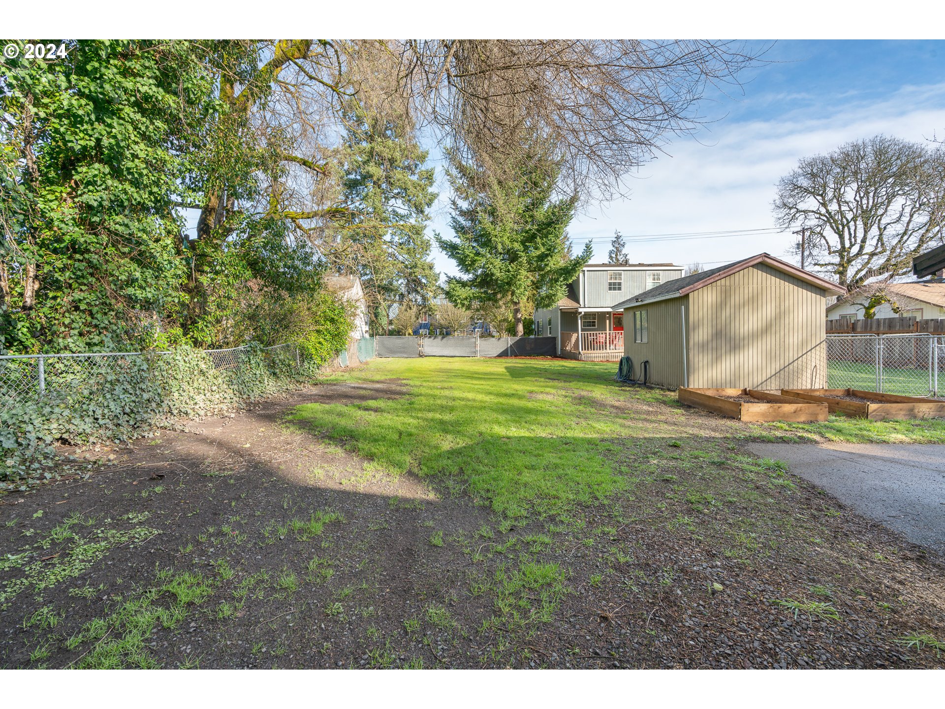 3305 Northwest Glencoe Road Hillsboro, OR 97124 - Photo 35 of 36 a view of a backyard with large trees
