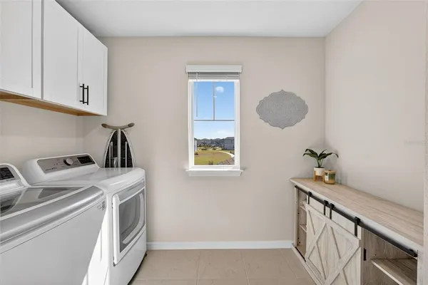 an aerial view of a house with outdoor space