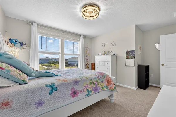 an aerial view of residential building and parking space