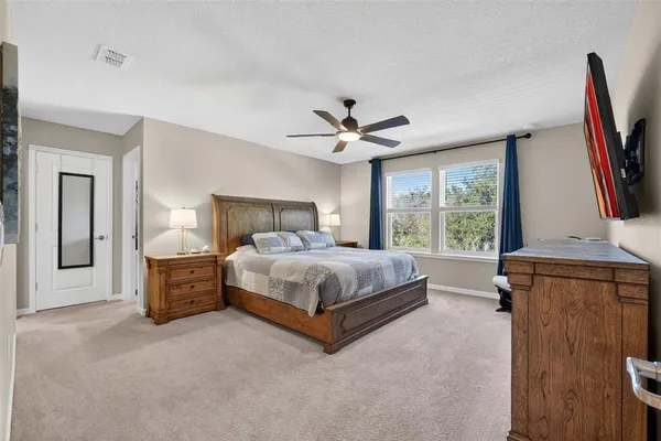 a view of a lake with a house