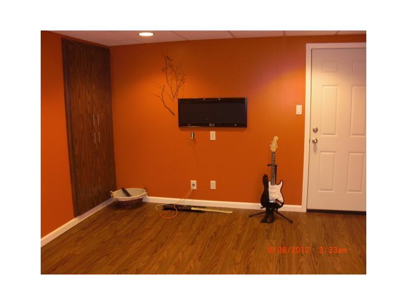 1139 Varner Road Whitehall, PA 15227 - Photo 10 of 18 Den/Family/Great Room. Newly finished gameroom with walk-out access to garage - newer full bath off the gameroom (laundry room on this level )