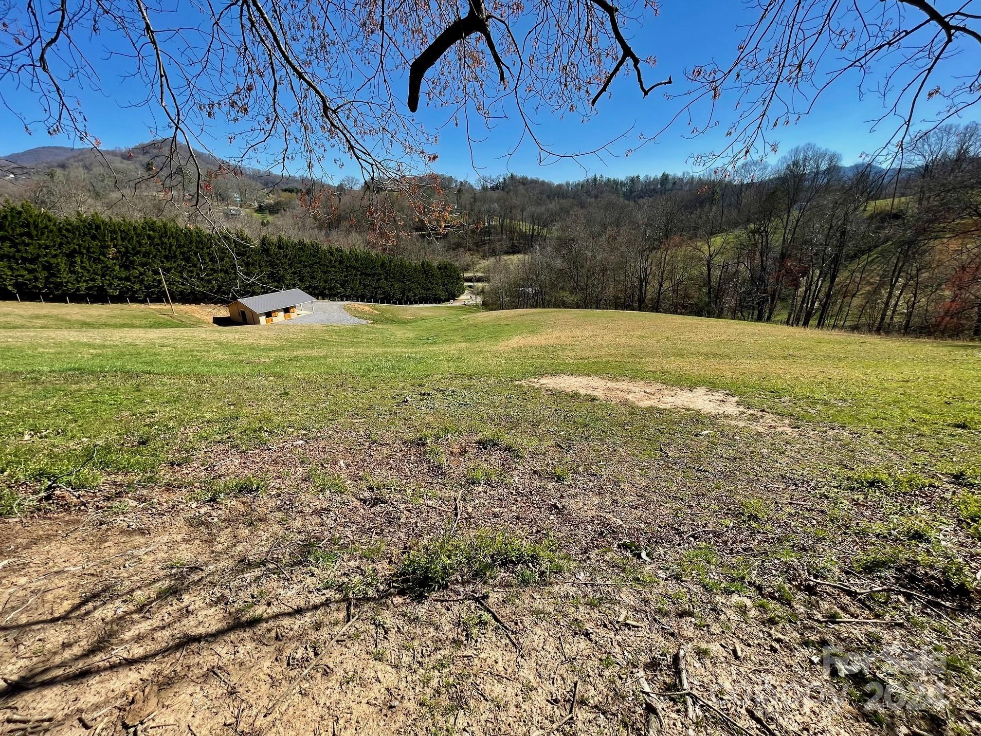 50 Glance Cove Road Clyde, NC 28721 - Photo 16 of 27 a view of outdoor space and yard