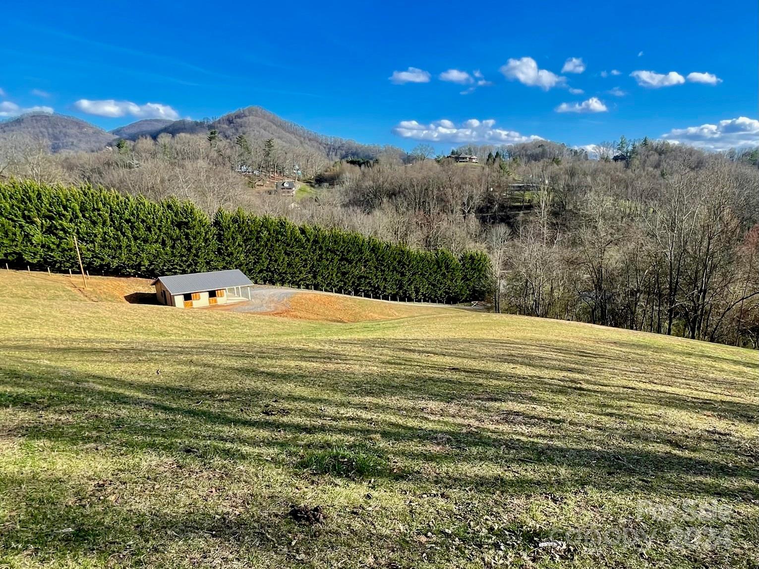 50 Glance Cove Road Clyde, NC 28721 - Photo 2 of 27 a view of water and mountain view