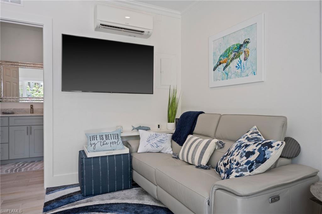 450 Launch Circle, Unit 201 Naples, FL 34108 - Photo 39 of 43 a living room with furniture