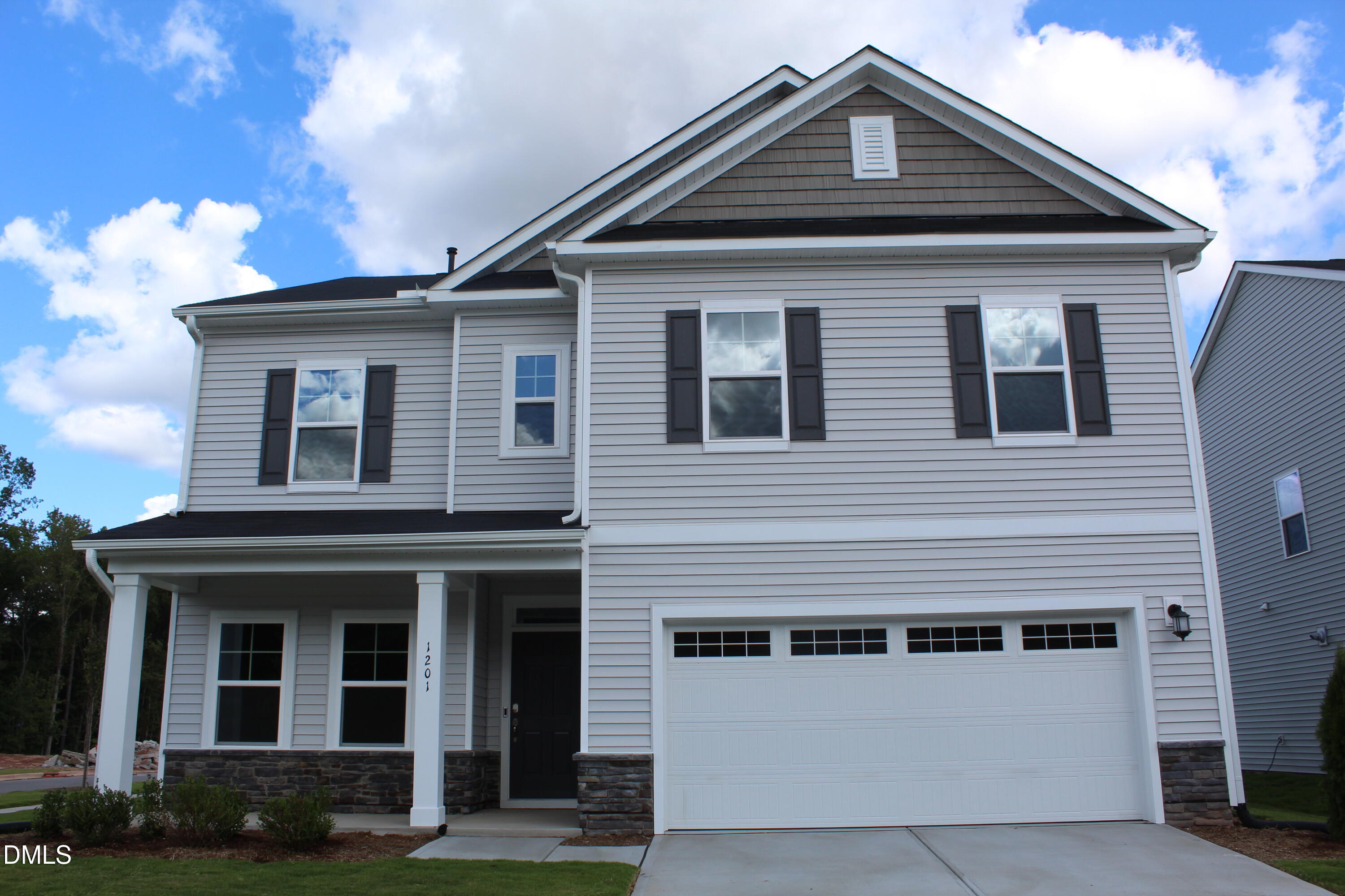 1201 Cosmic Drive Durham, NC 27703 - Photo 1 of 51 a front view of a house with a yard