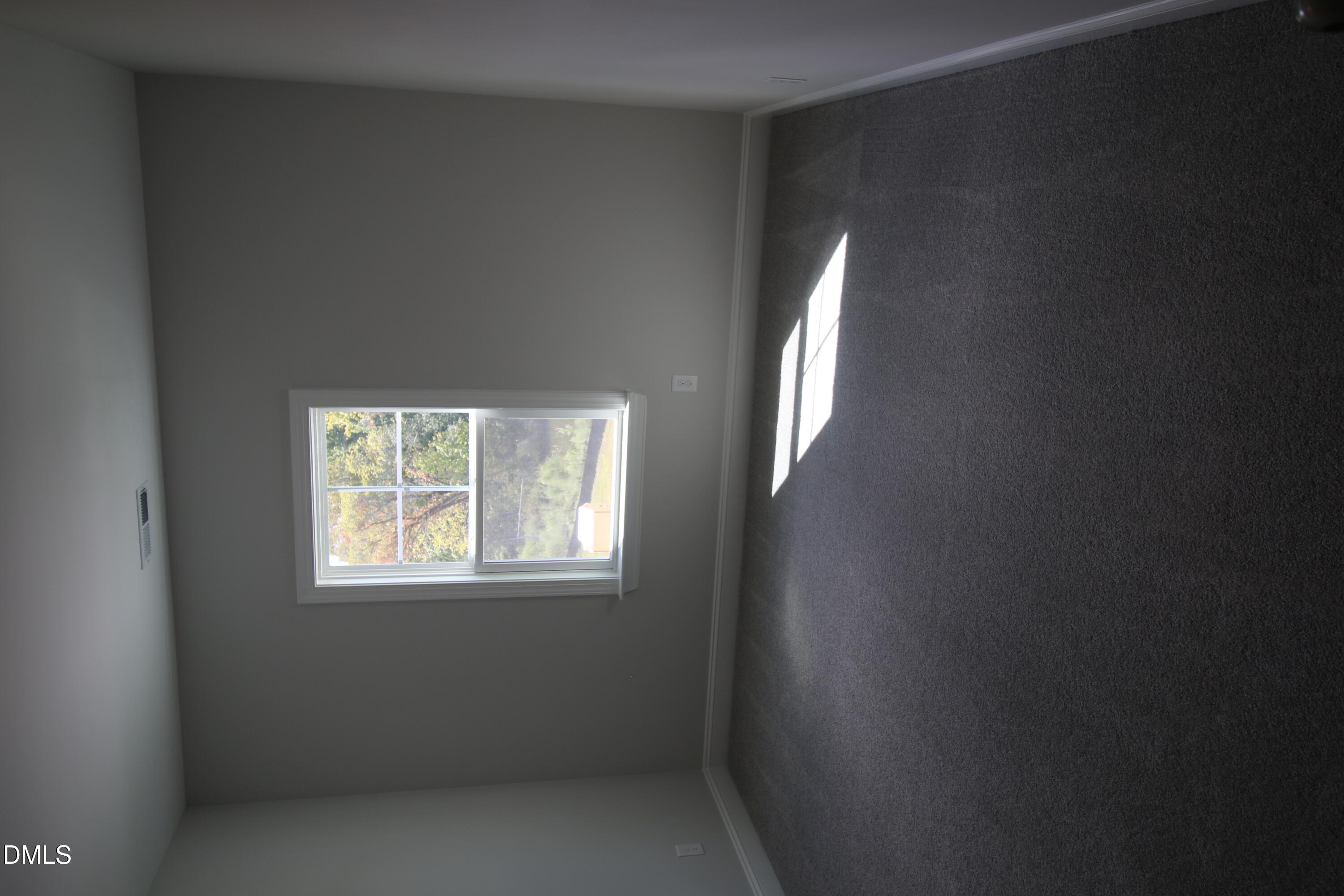 1201 Cosmic Drive Durham, NC 27703 - Photo 15 of 51 a view of an empty room with a window