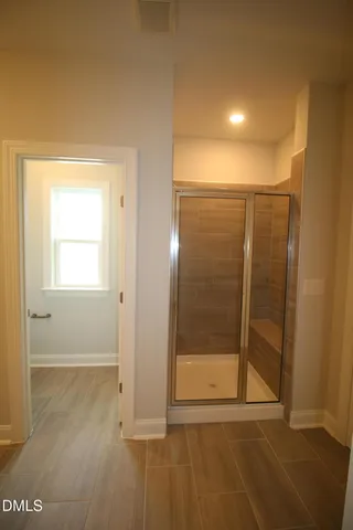 a view of a room with racks on the wall