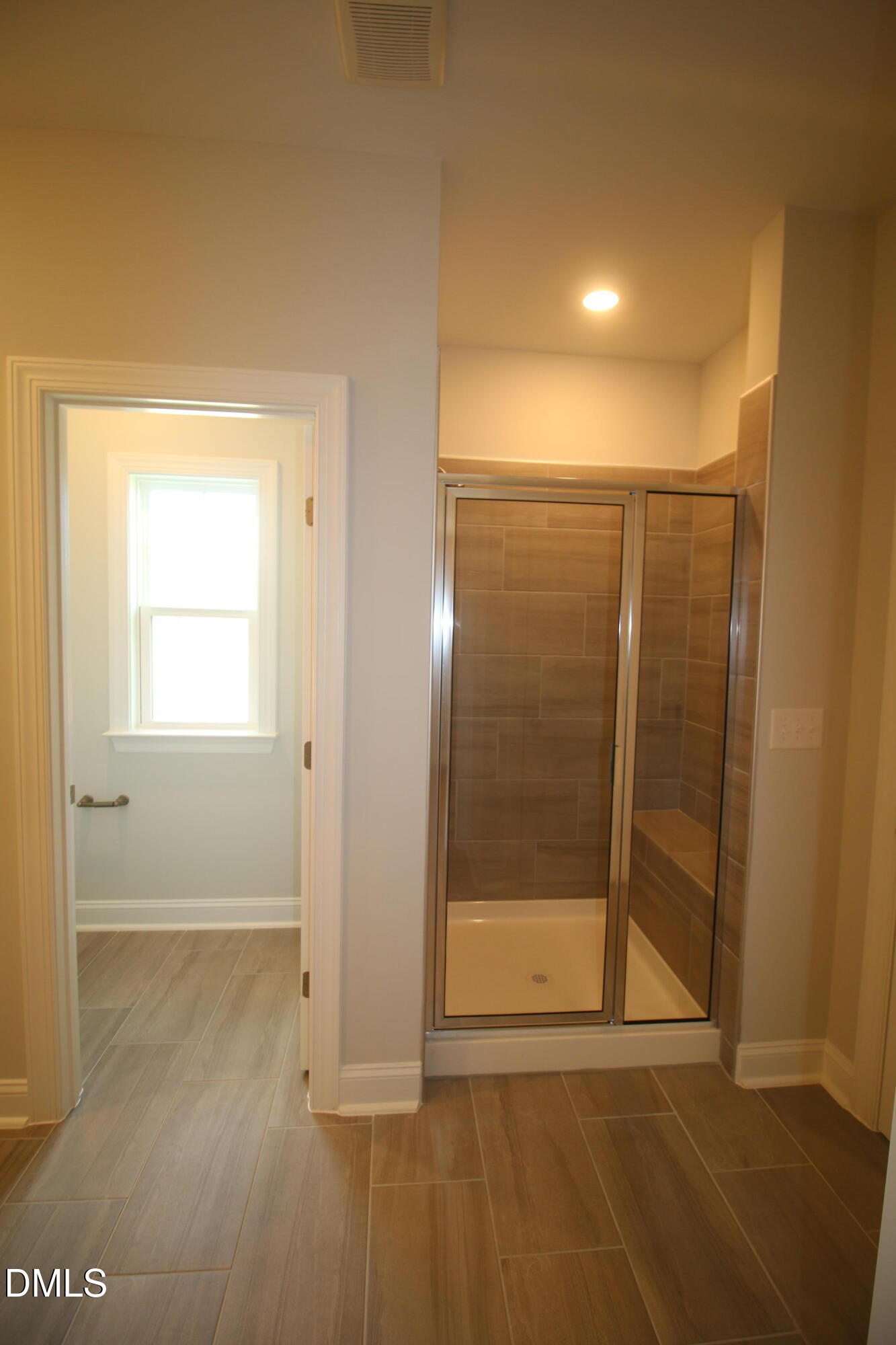 1201 Cosmic Drive Durham, NC 27703 - Photo 24 of 51 a view of a bathroom with sliding glass door