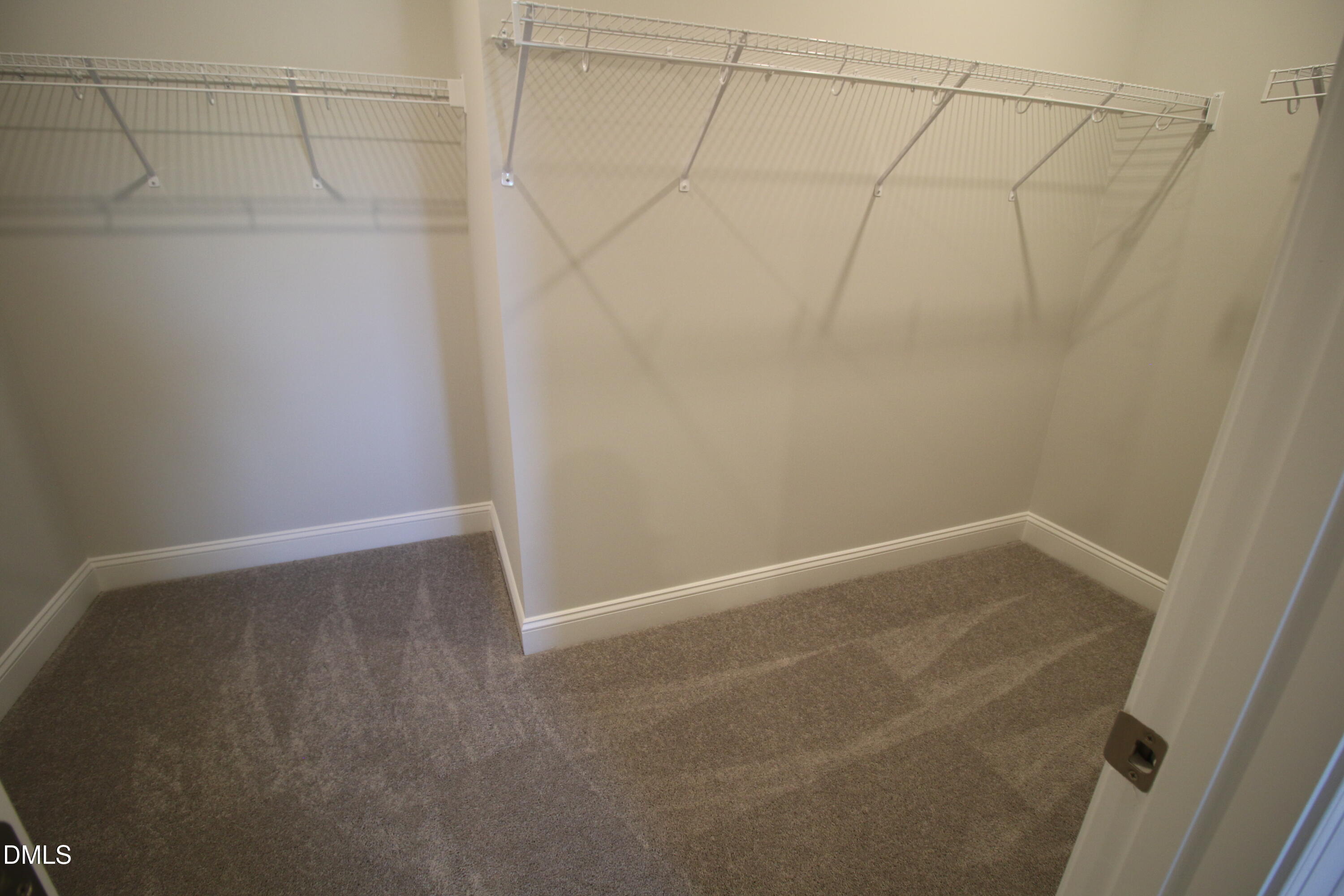 1201 Cosmic Drive Durham, NC 27703 - Photo 25 of 51 a view of a room with racks on the wall