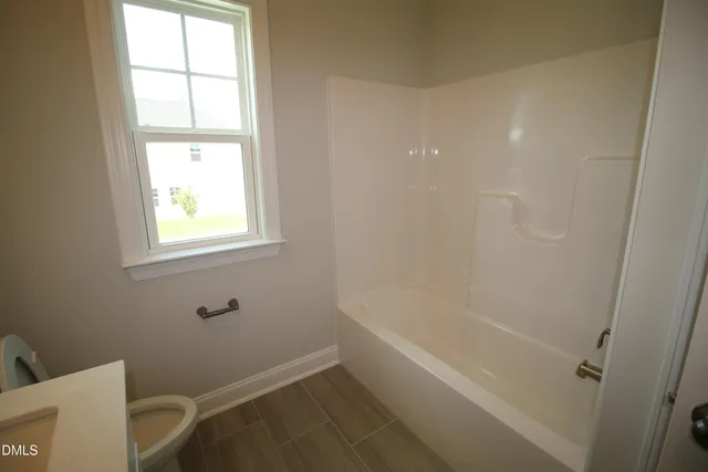 a bathroom with a bathtub