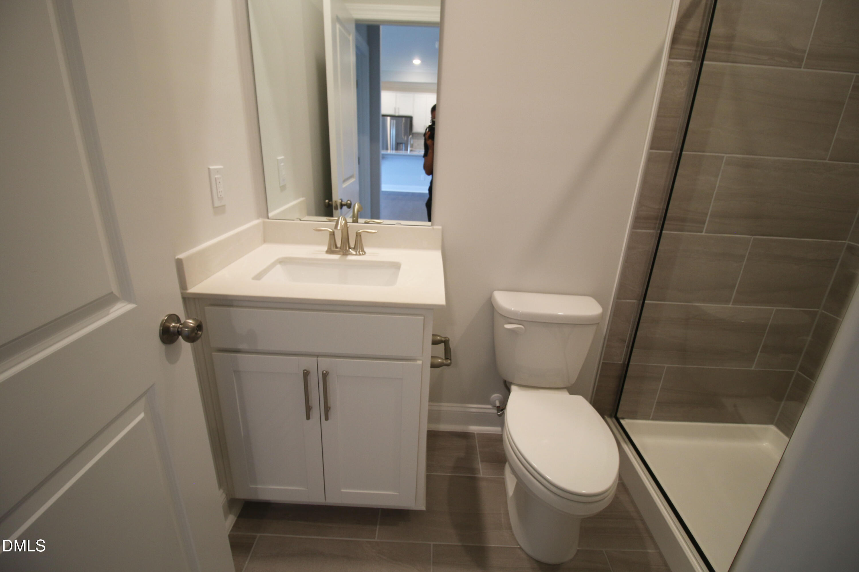 1201 Cosmic Drive Durham, NC 27703 - Photo 40 of 51 a white toilet sitting next to a white sink