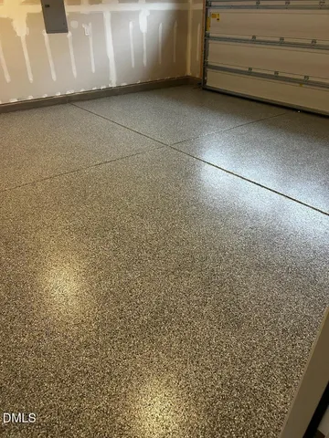 an aerial view of a house with swimming pool