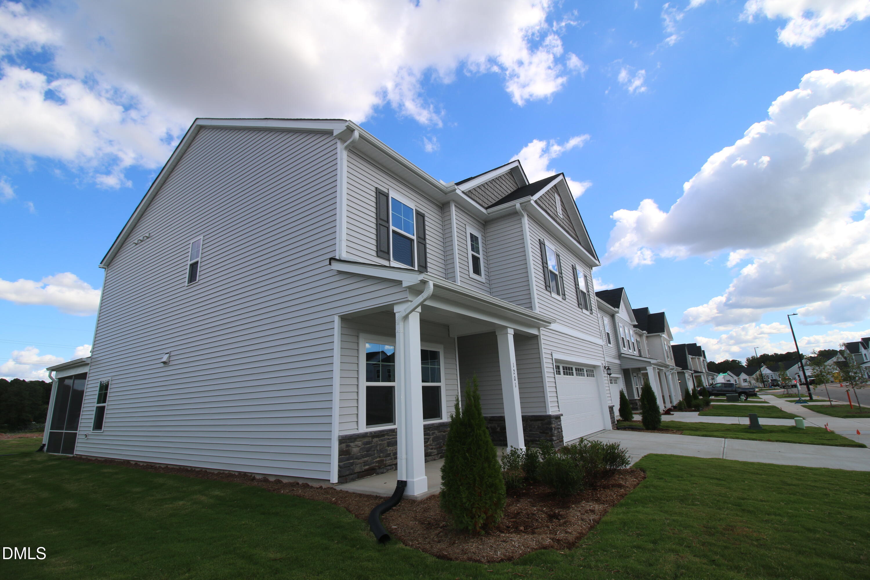 1201 Cosmic Drive Durham, NC 27703 - Photo 4 of 51 a front view of a house with a yard