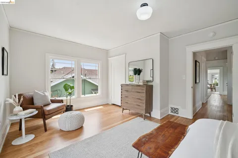 a bedroom with bed and a window