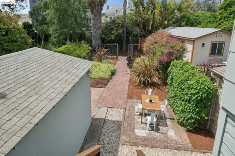 a view of a chairs and table in the patio