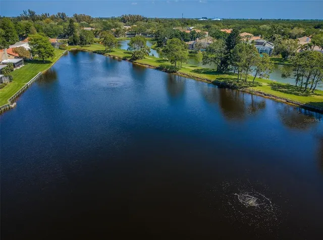 a view of entryway with wooden floor and stairs