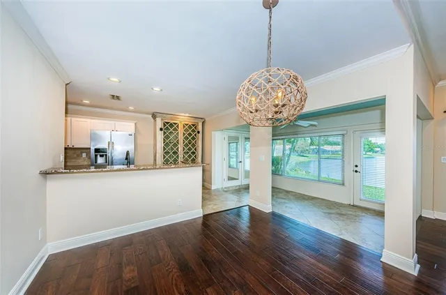 a kitchen with stainless steel appliances granite countertop a stove and a sink