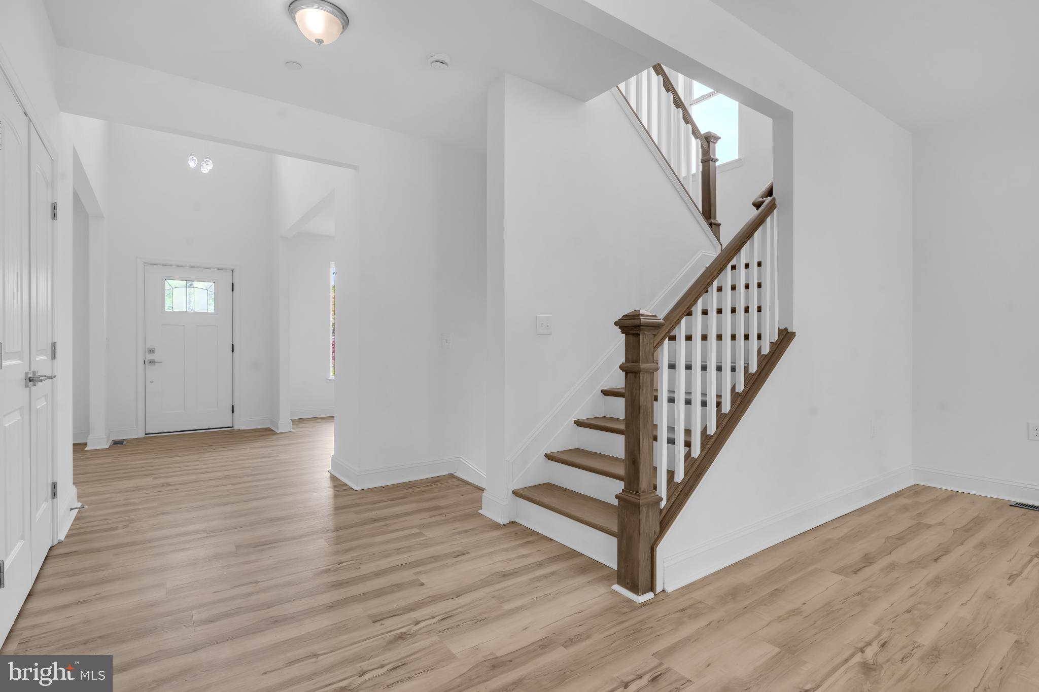 413 Trimble Road Joppa, MD 21085 - Photo 15 of 54 Bright and inviting entryway with staircase.