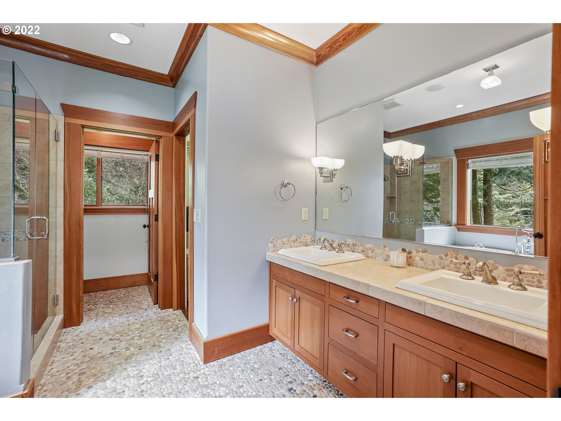 35719 Southeast Lusted Road Boring, OR 97009 - Photo 13 of 32 a bathroom with a sink a mirror and a shower
