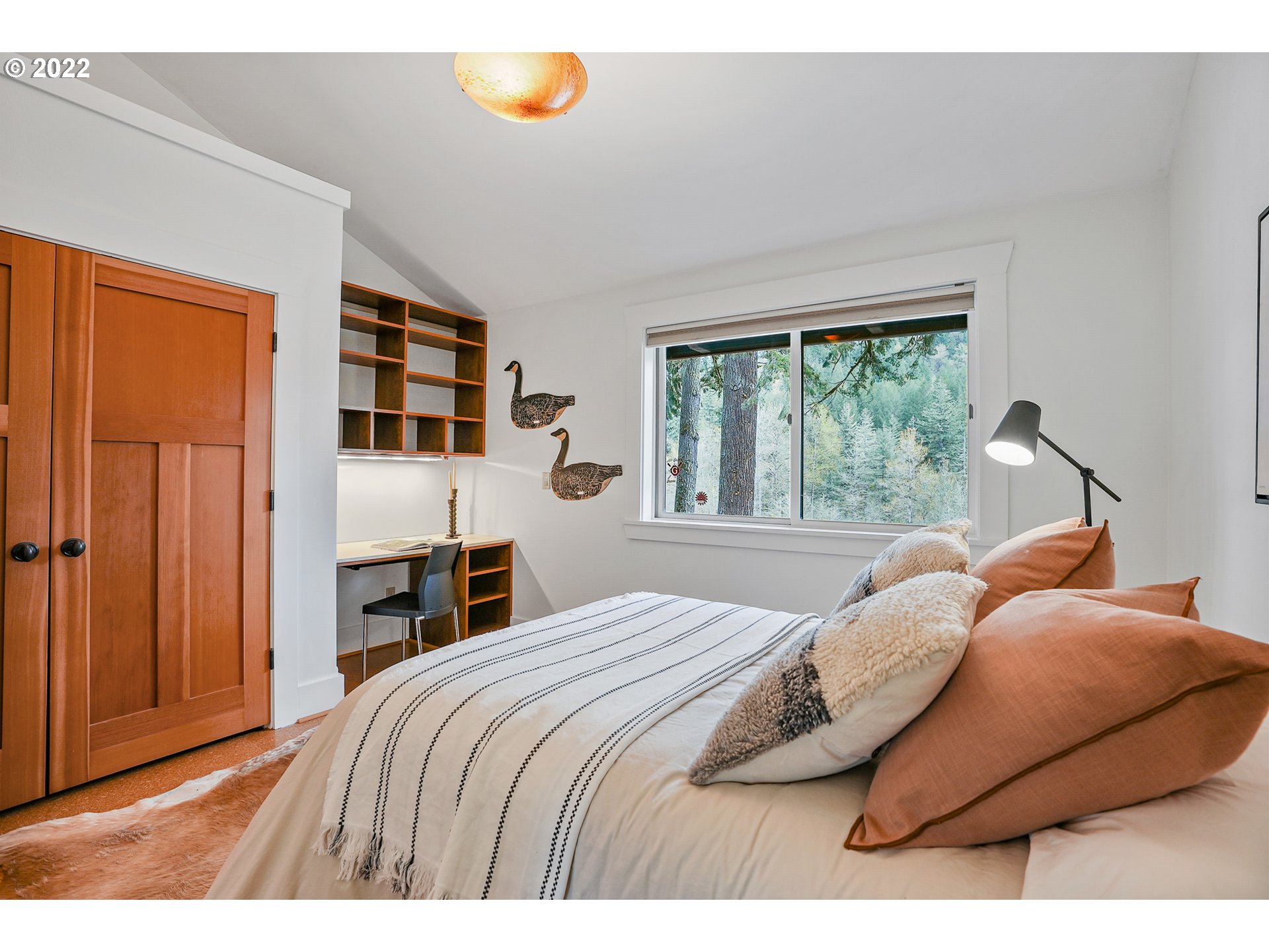 35719 Southeast Lusted Road Boring, OR 97009 - Photo 18 of 32 a bedroom with a bed and a window