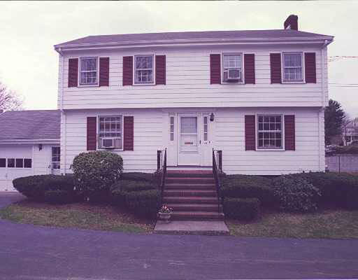 14 Maxwell Road Milton, MA 02186 - Photo 1 of 1 a front view of a house with a yard