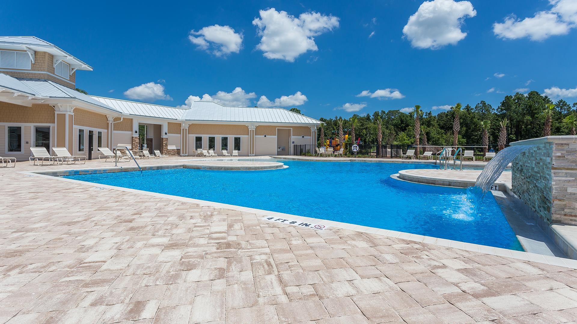578 Deer Crossing Road St. Augustine, FL 32086 - Photo 25 of 28 a view of a house with swimming pool and sitting area