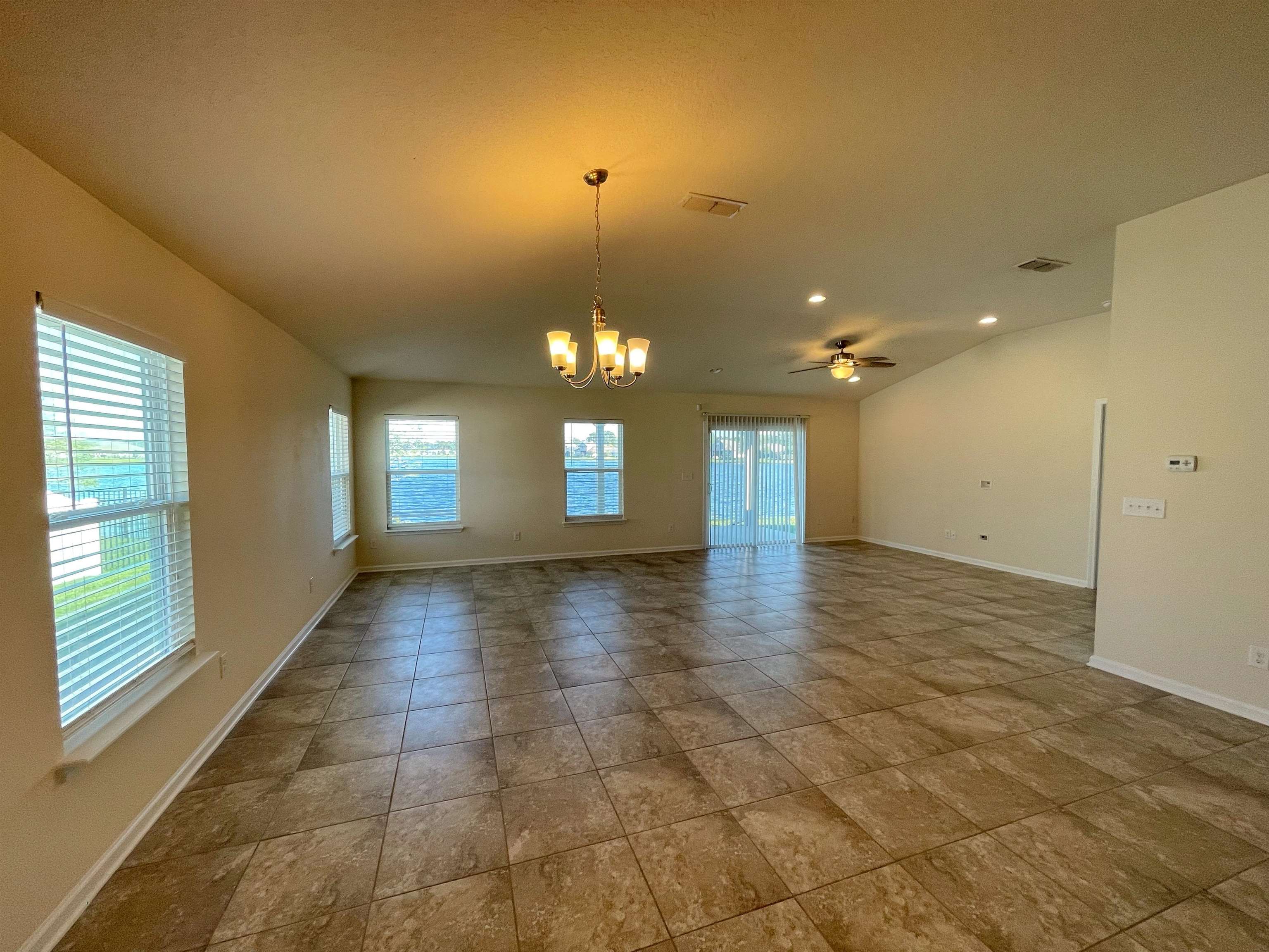 578 Deer Crossing Road St. Augustine, FL 32086 - Photo 9 of 28 a view of empty room with window