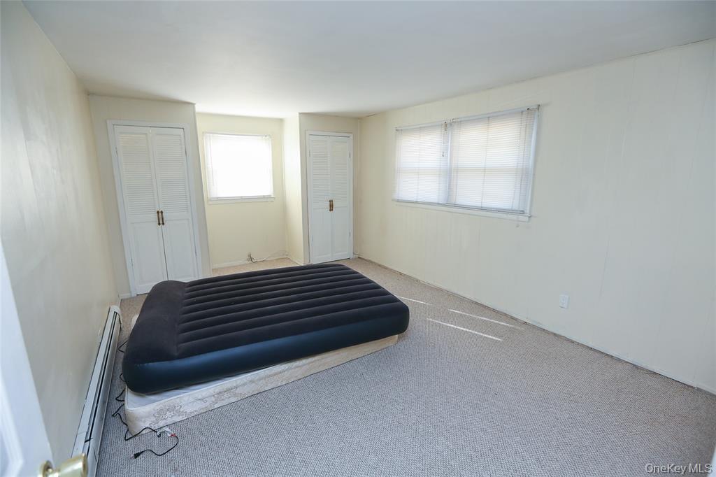 40 Bluefields Lane Blauvelt, NY 10913 - Photo 4 of 11 a view of a room with wooden floor and window