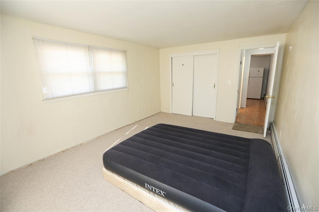 40 Bluefields Lane Blauvelt, NY 10913 - Photo 6 of 11 a room with a bed and a window