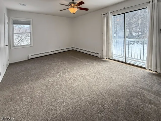 a view of swimming pool with a yard