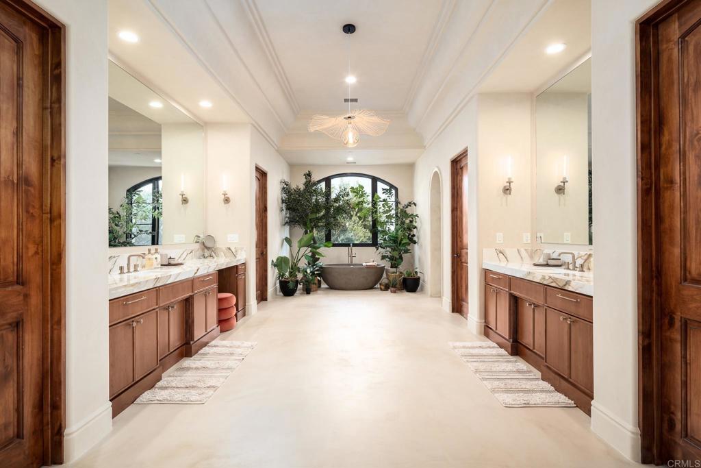 18000 Sunset Point Road Poway, CA 92064 - Photo 15 of 36 a large bathroom with a large tub and sink