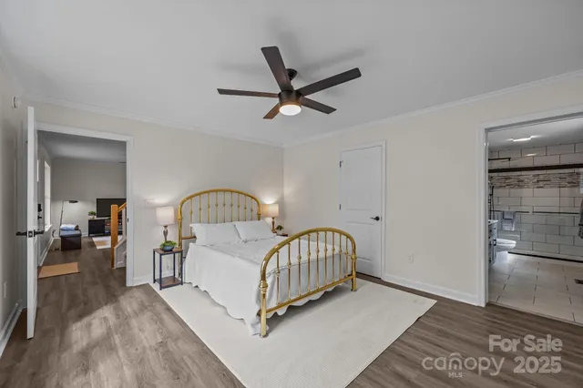 a bedroom with a bed and a table