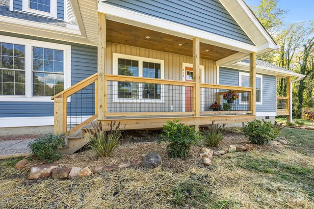 a view of a balcony with wooden floor