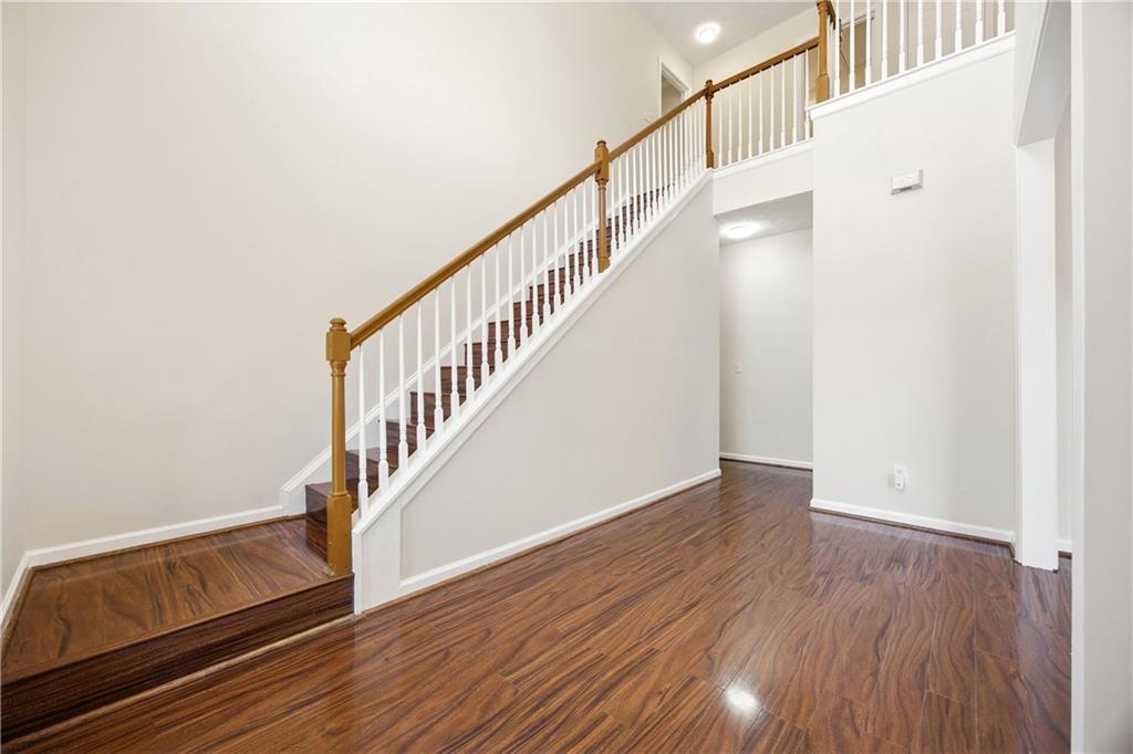 3393 Morning Top Place Suwanee, GA 30024 - Photo 2 of 34 a view of entryway with wooden floor
