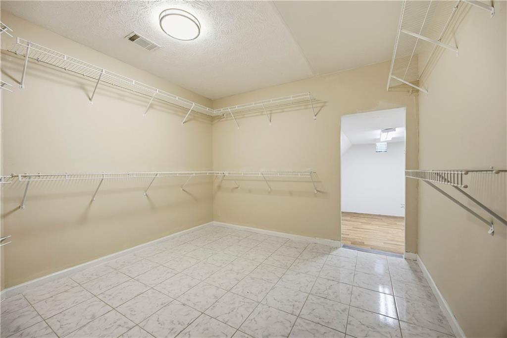 3393 Morning Top Place Suwanee, GA 30024 - Photo 25 of 34 a view of a room with white walls