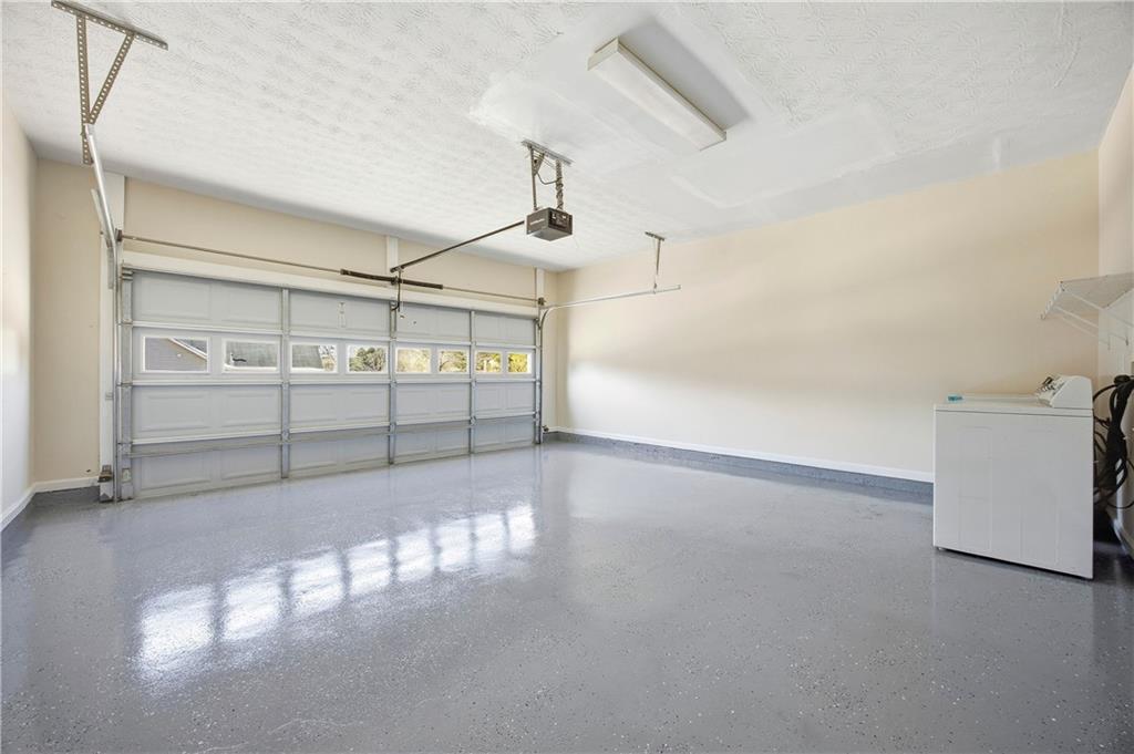 3393 Morning Top Place Suwanee, GA 30024 - Photo 33 of 34 a view of a garage