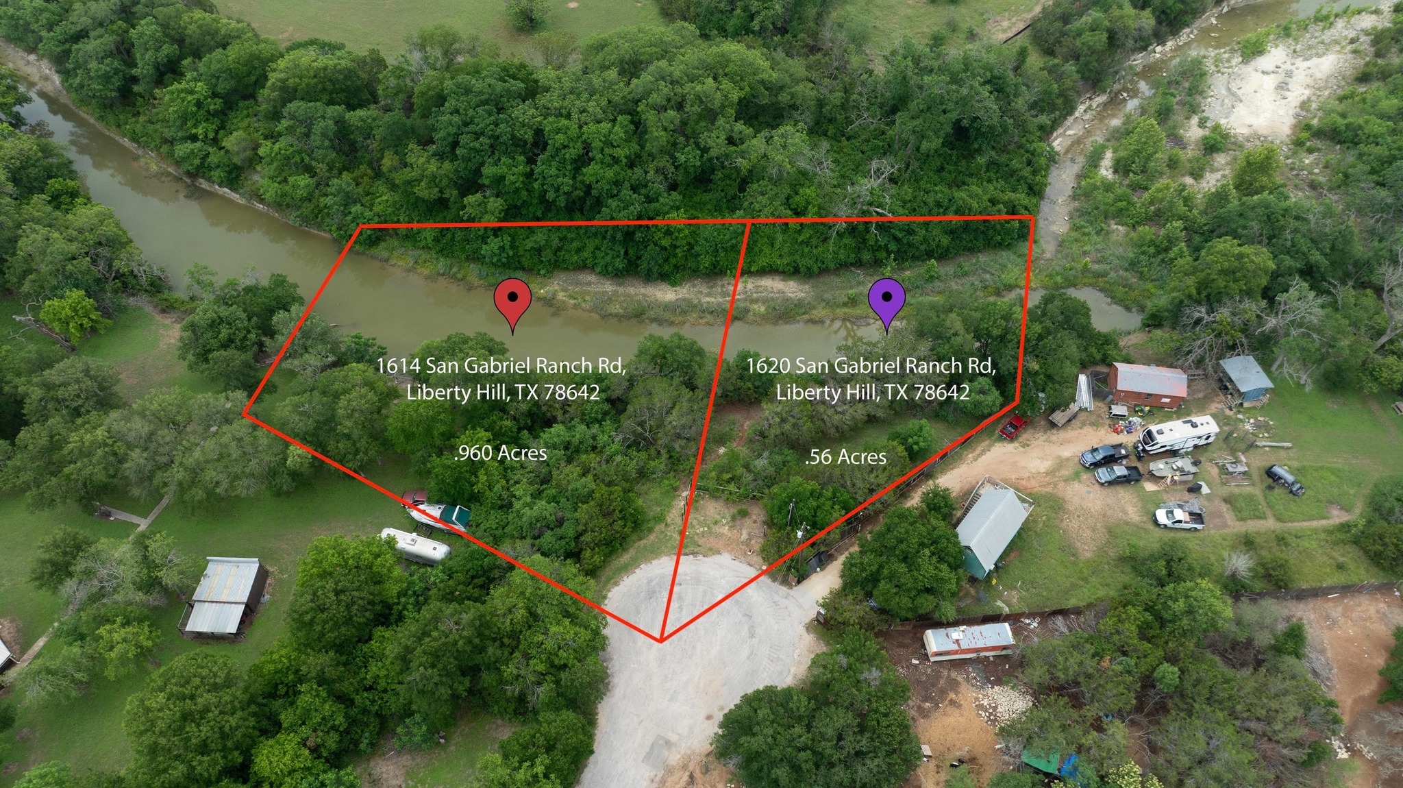 an aerial view of house with yard