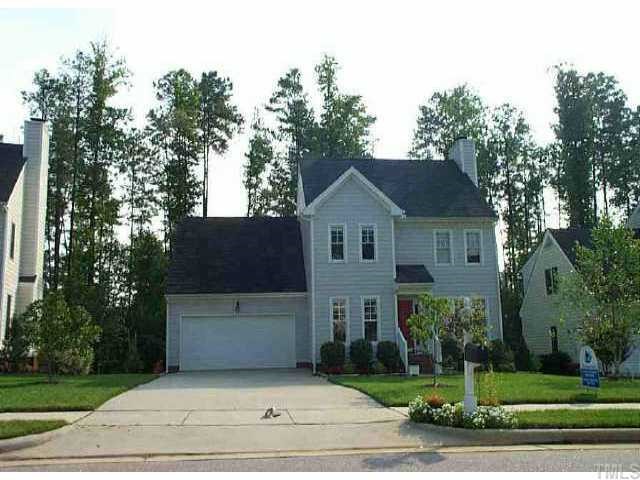 2912 Dahlgreen Road Raleigh, NC 27615 - Photo 1 of 1 a front view of a house with a yard and garage