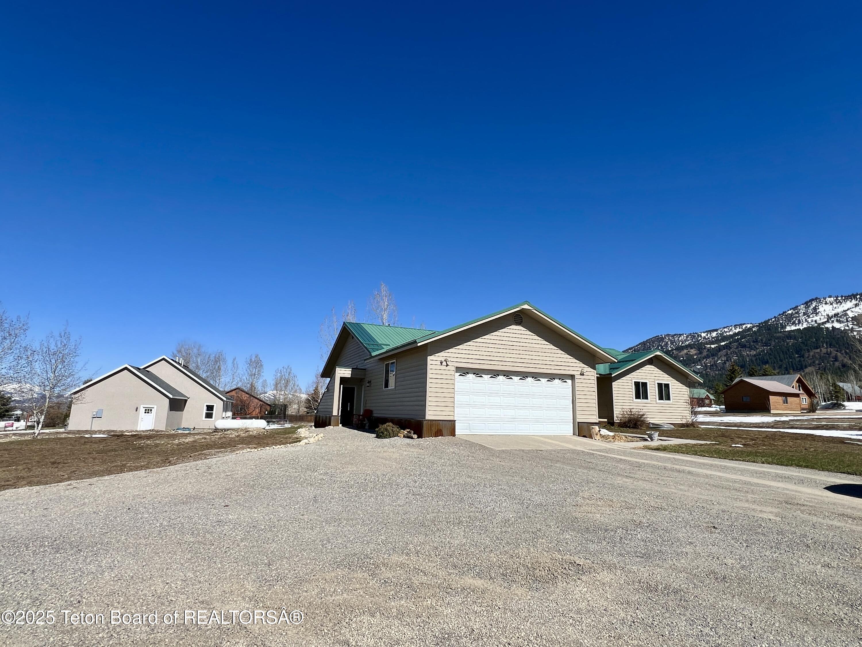 341 Alta Drive Star Valley Ranch, WY 83127 - Photo 2 of 33 IMG_1981