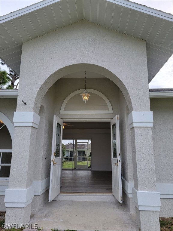 17565 Braddock Road Fort Myers, FL 33967 - Photo 3 of 19 a close view of a livingroom with a fireplace and window