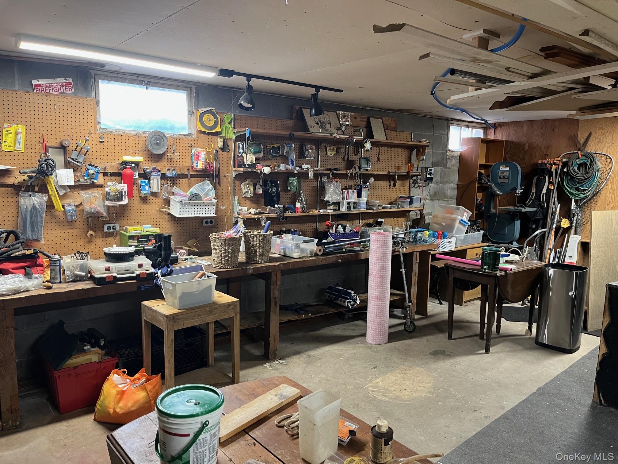 178 Barnes Road, Unit MAIN HOUSE Brookhaven, NY 11955 - Photo 11 of 17 a room with lots of wooden furniture