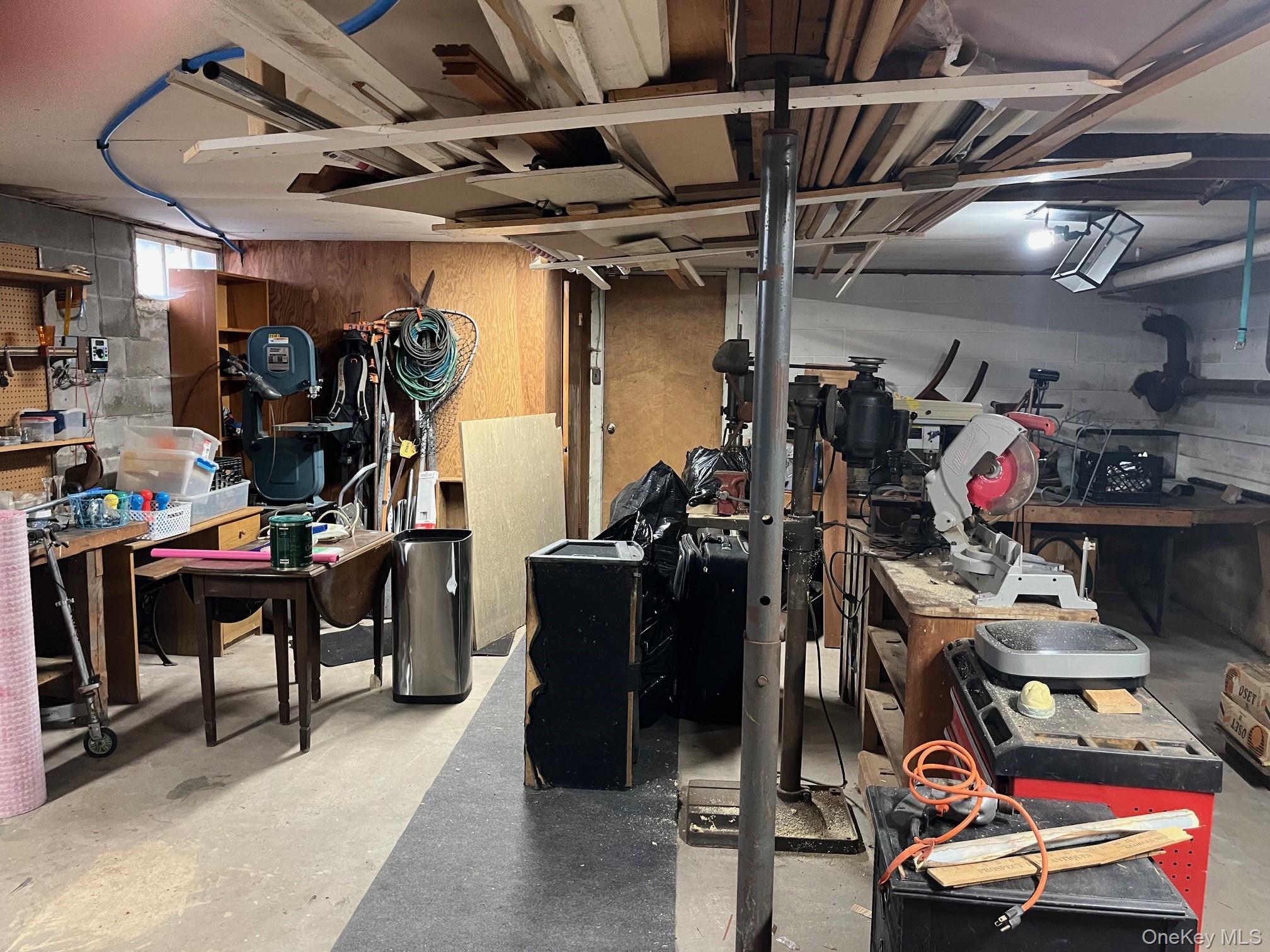 178 Barnes Road, Unit MAIN HOUSE Brookhaven, NY 11955 - Photo 12 of 17 a view of a room with gym equipment